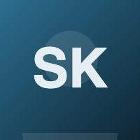 White letters "SK" on dark blue circular background